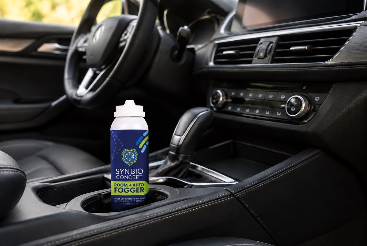 Synbio Concept Room and Auto Fogger seated inside a vehicle cup holder